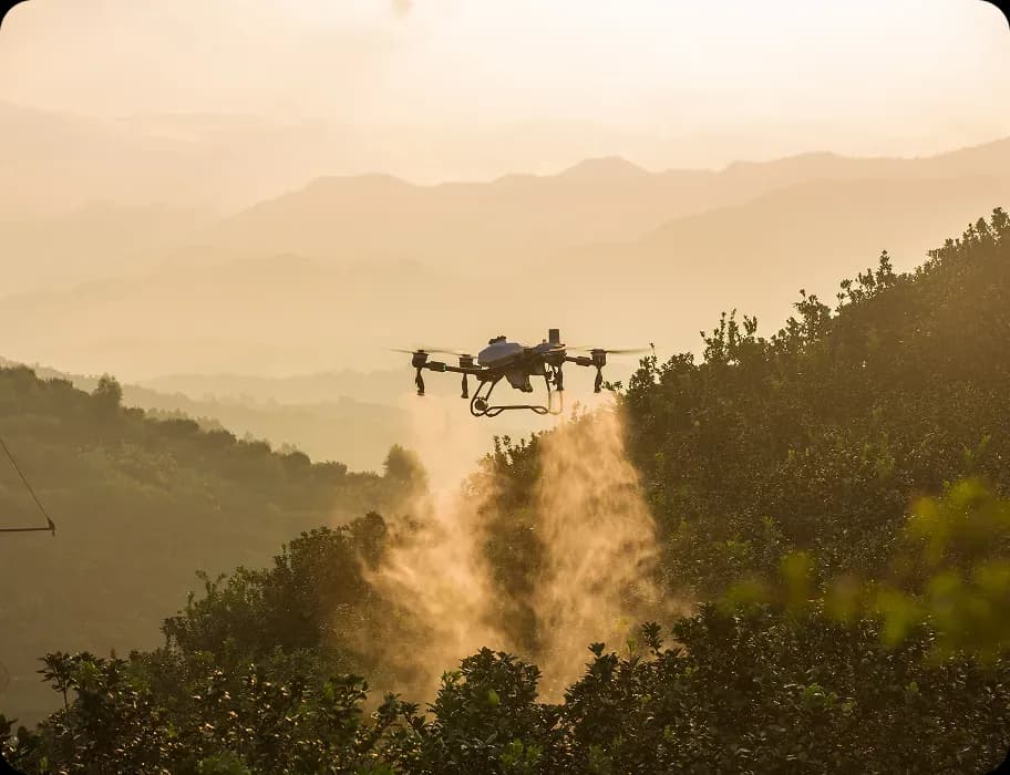 Agricultural drone spraying a crop field